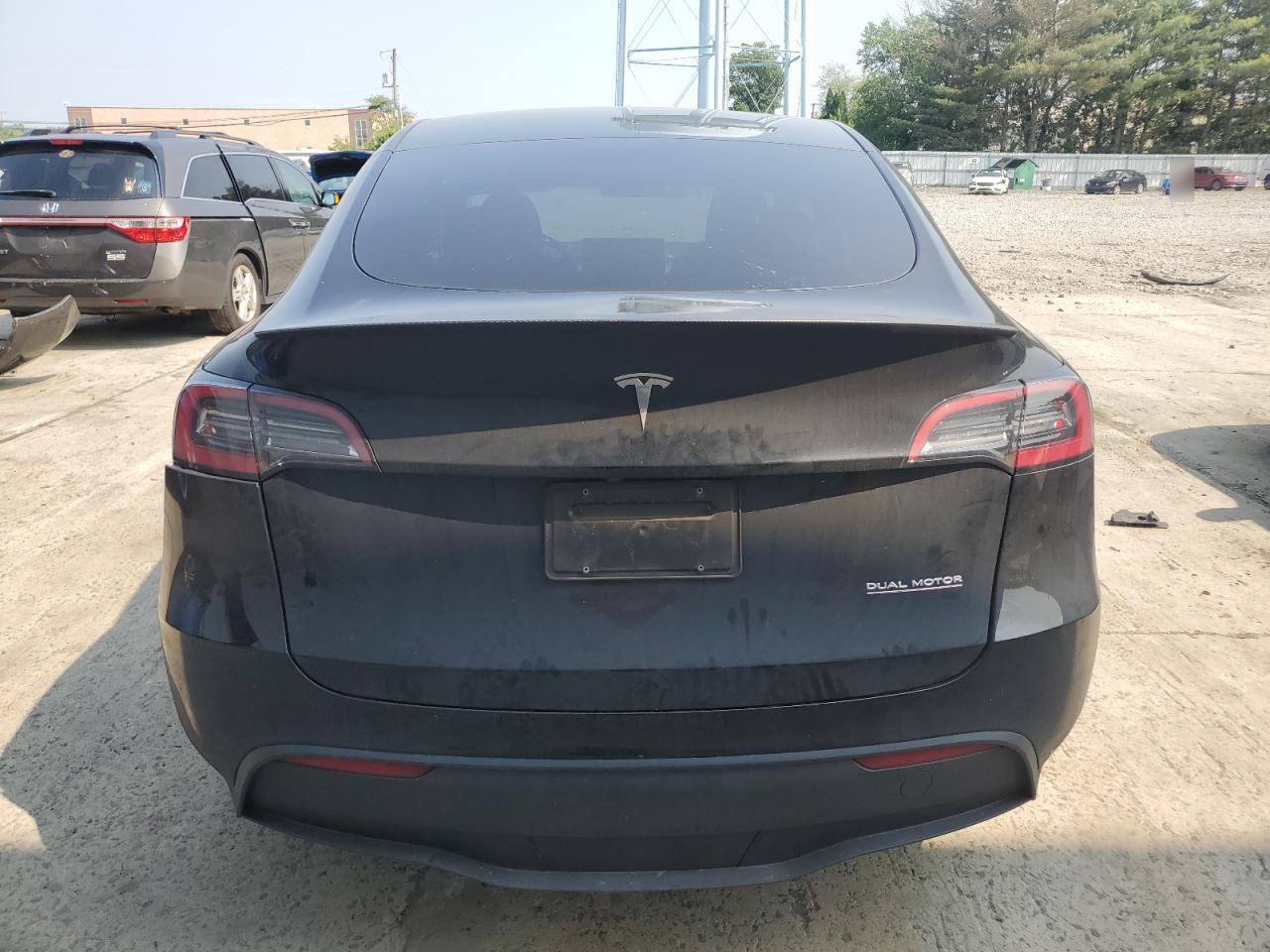 2023 Tesla Model Y VIN: 7SAYGDEF6PF860826 Lot: 60297665