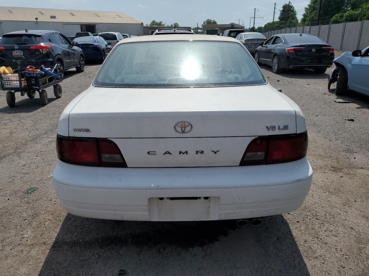 1995 Toyota Camry Le VIN: 4T1GK12E2SU087124 Lot: 61196345