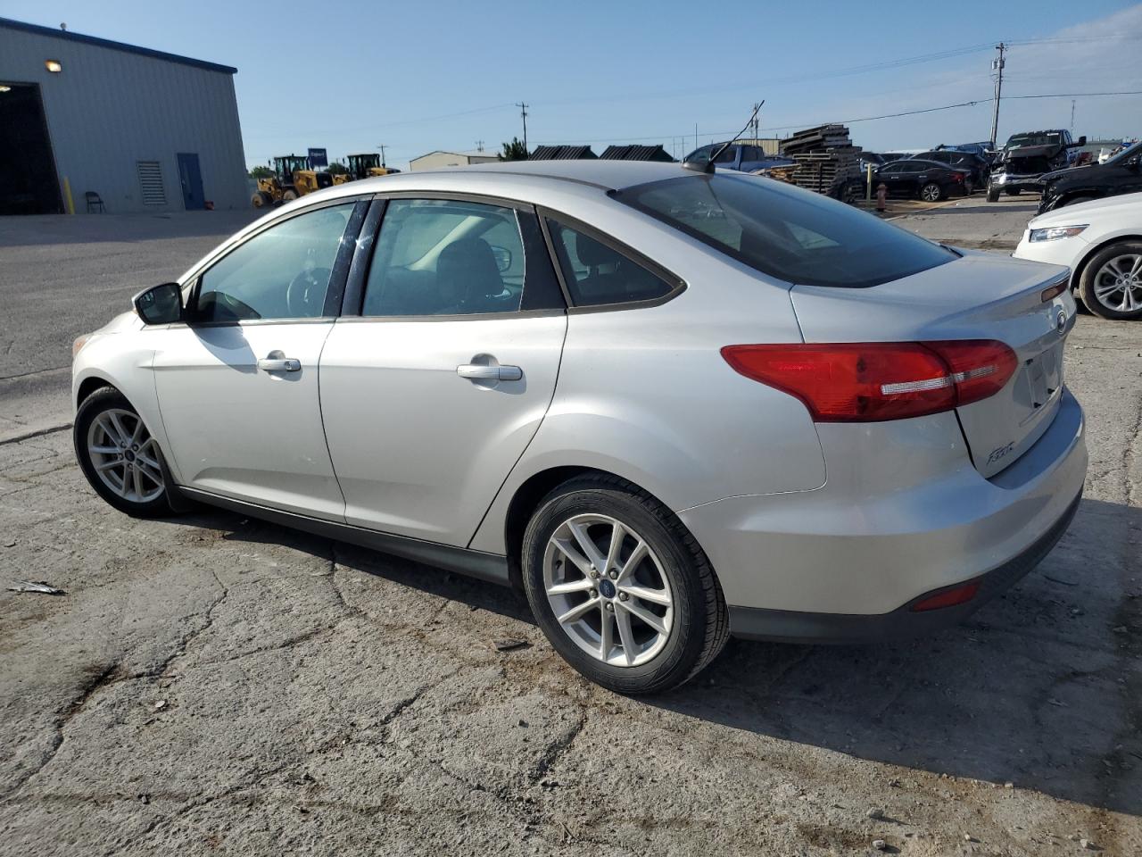 FORD FOCUS 2015 VIN 1FADP3F28FL234097 фото 2