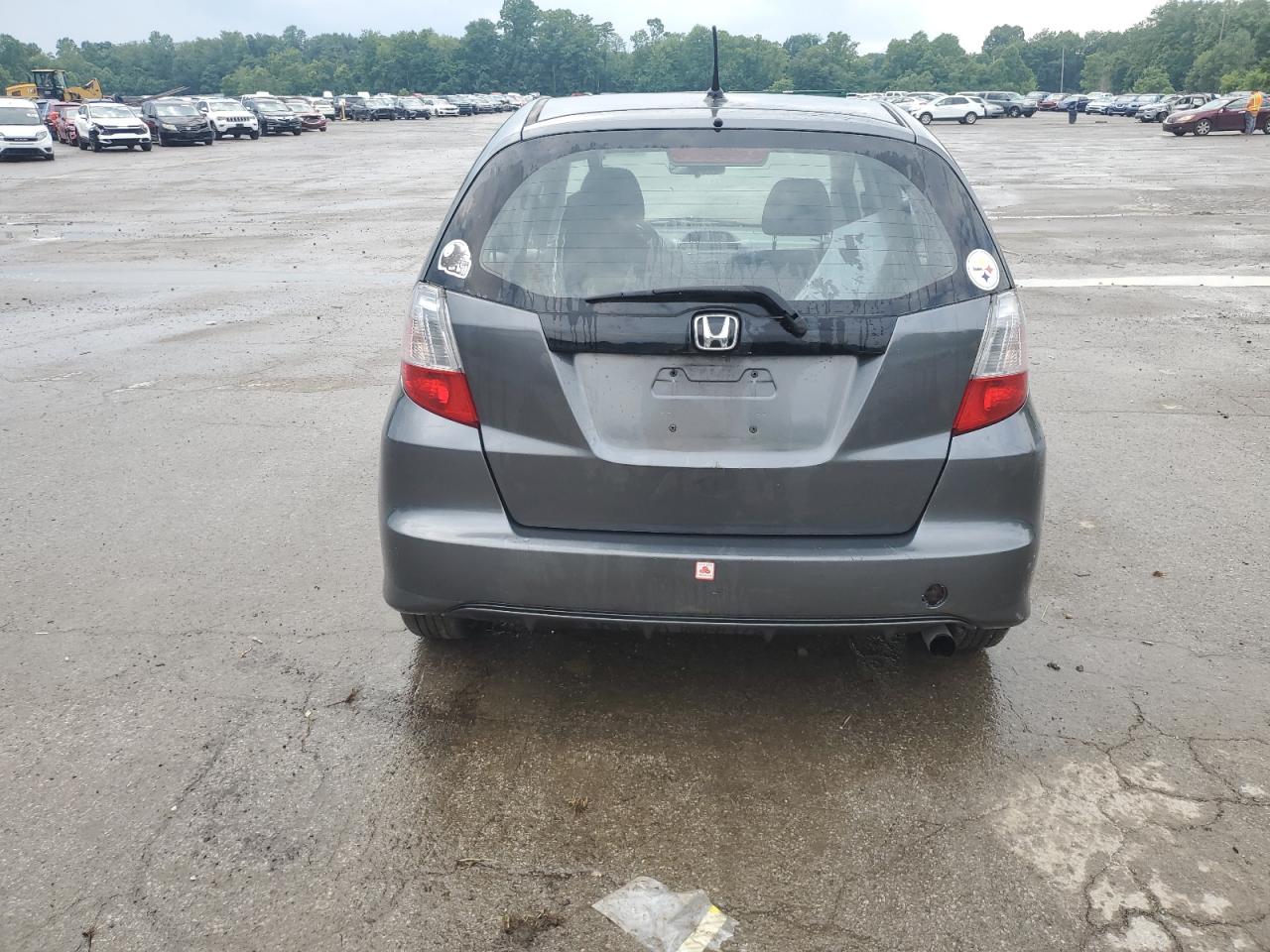 2011 Honda Fit VIN: JHMGE8H3XBC027333 Lot: 62495275