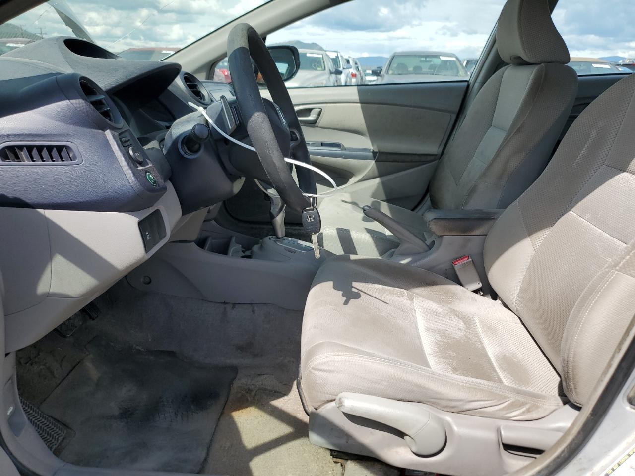 2010 Honda Insight Ex VIN: JHMZE2H75AS026040 Lot: 59714985