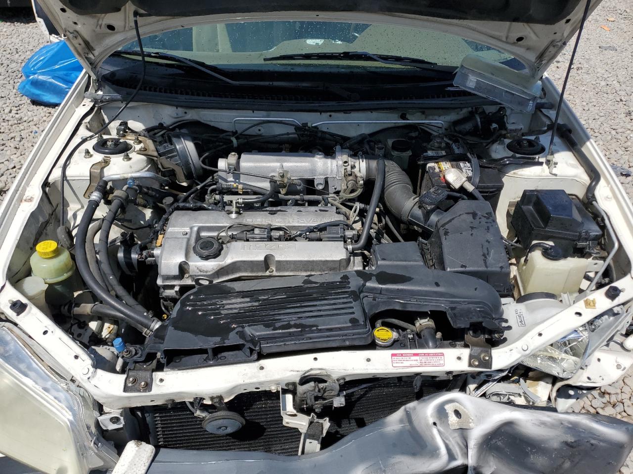 2000 Mazda Protege Dx VIN: JM1BJ2224Y0203582 Lot: 62561055