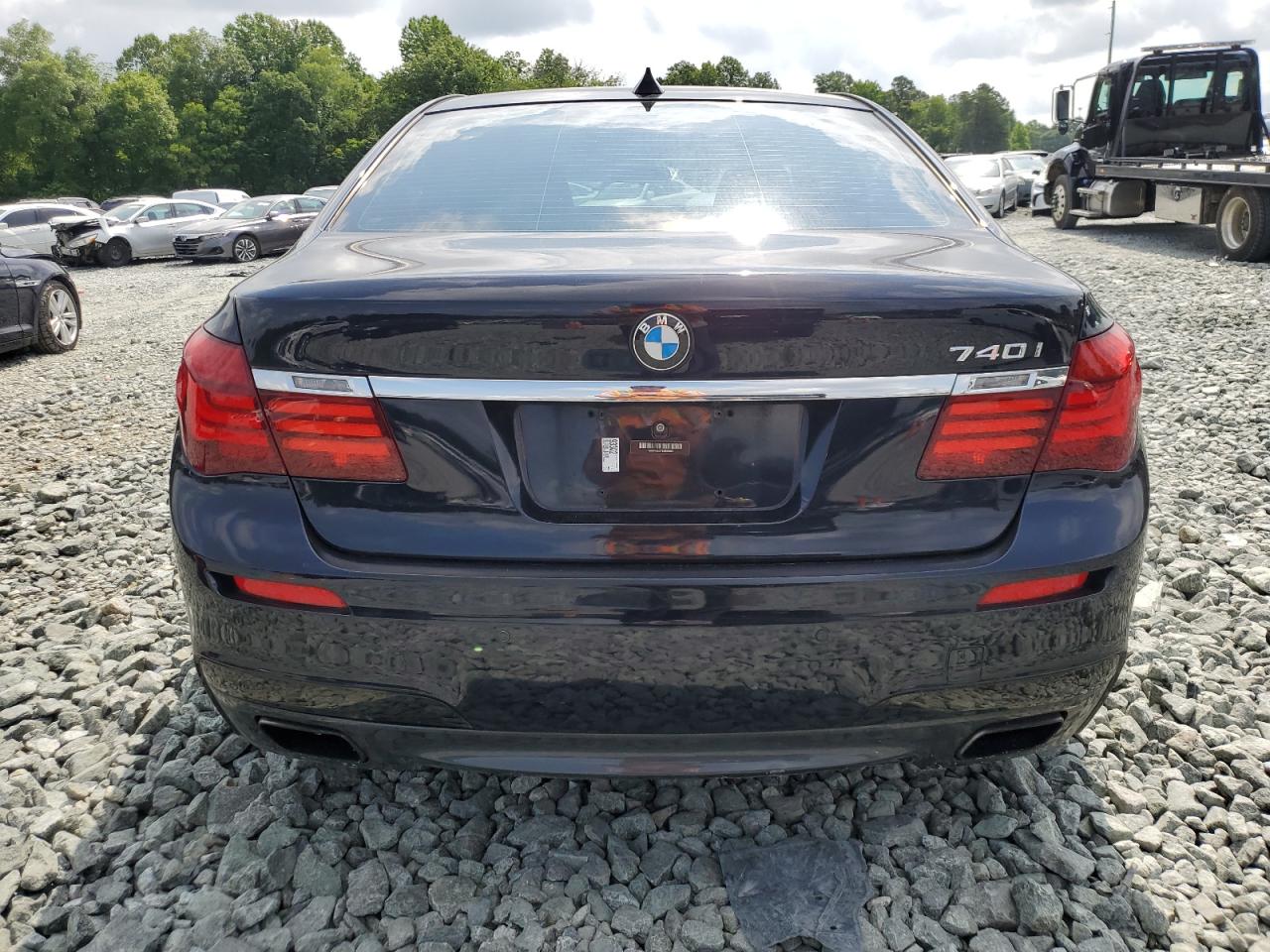 2014 BMW 740 I VIN: WBAYA6C57ED826660 Lot: 59566945