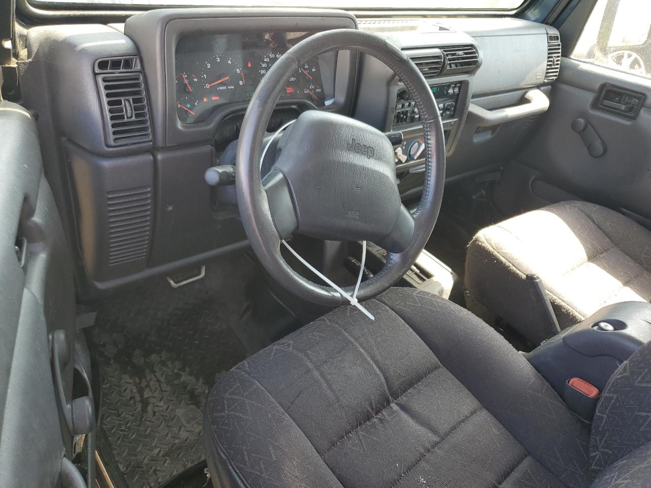 2002 Jeep Wrangler / Tj Sport VIN: 1J4FA49S92P709775 Lot: 61345735