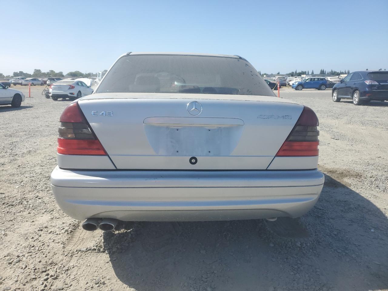 1998 Mercedes-Benz C 43 VIN: WDBHA33G2WF702562 Lot: 62342305