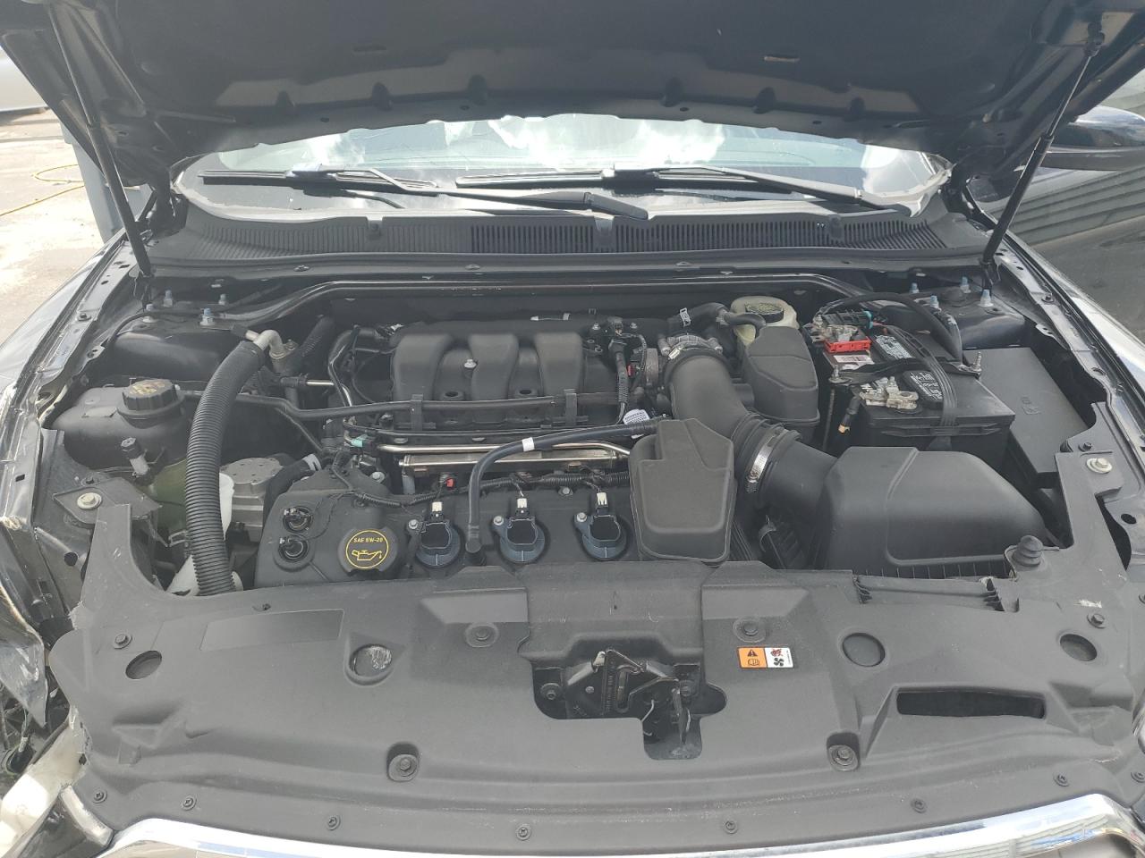 2016 Ford Taurus Sel VIN: 1FAHP2E86GG141252 Lot: 60701595