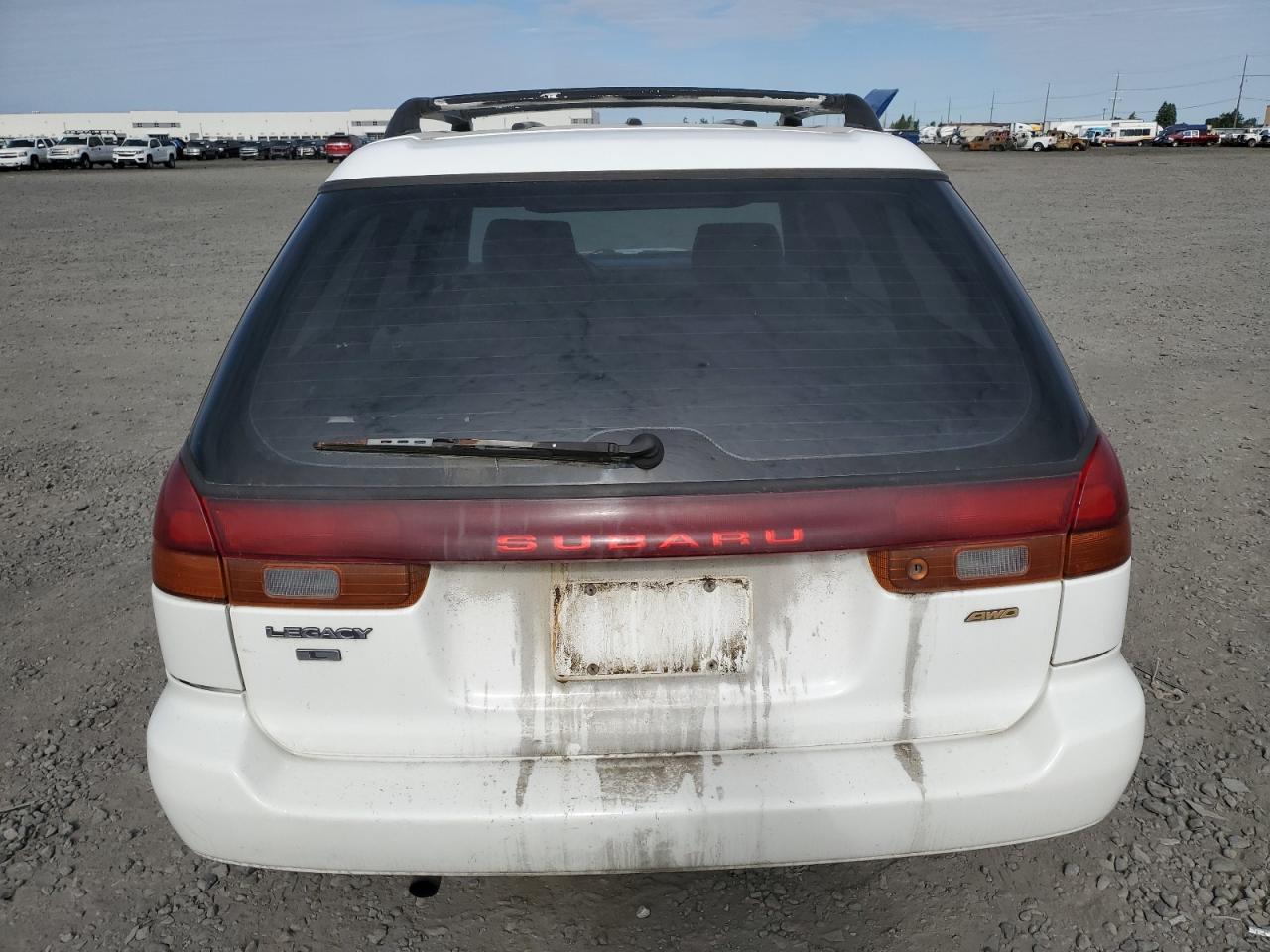 1997 Subaru Legacy L VIN: 4S3BK4359V7309059 Lot: 59600835