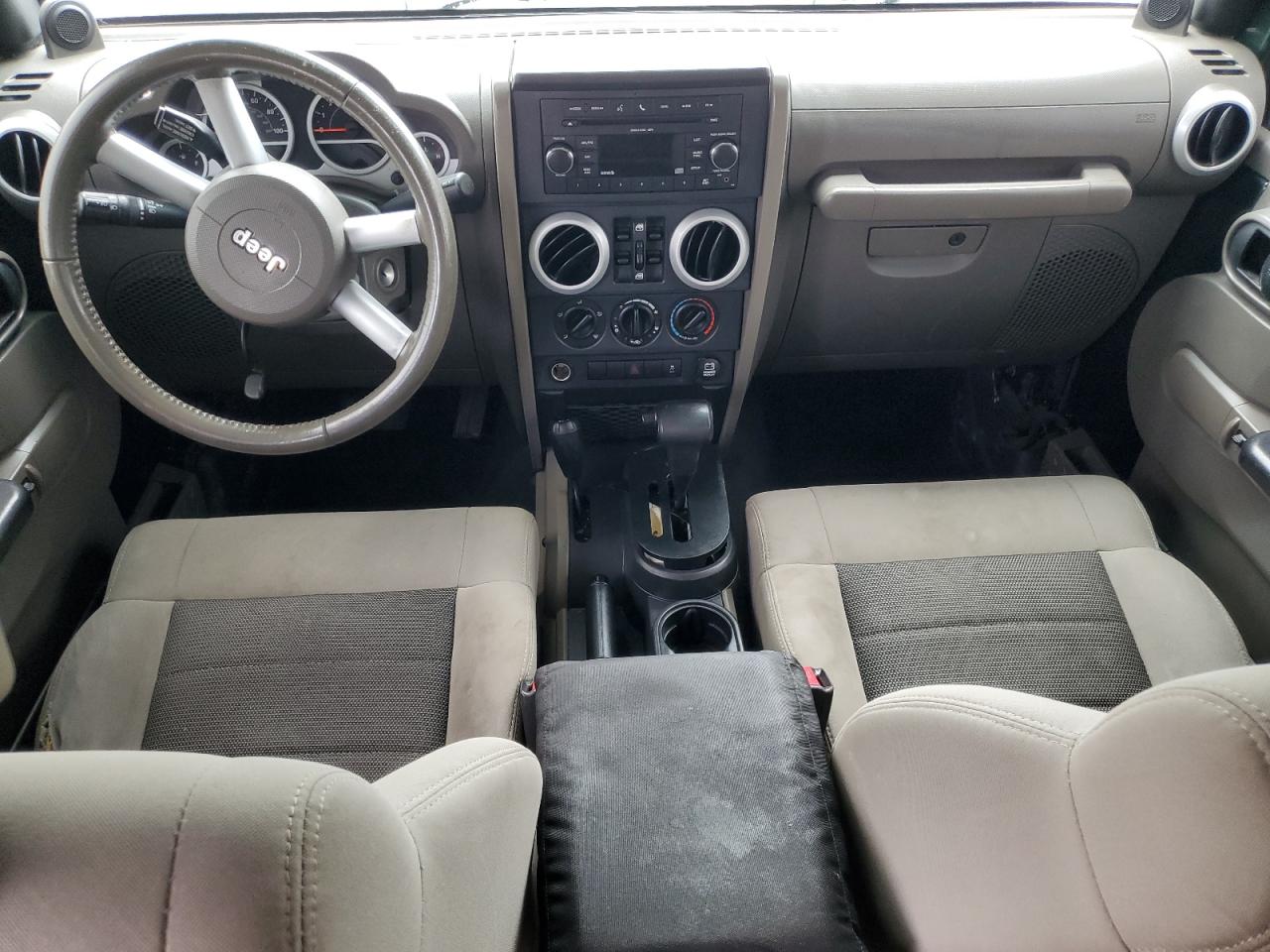 2010 Jeep Wrangler Unlimited Sahara VIN: 1J4BA5H19AL125699 Lot: 62908025