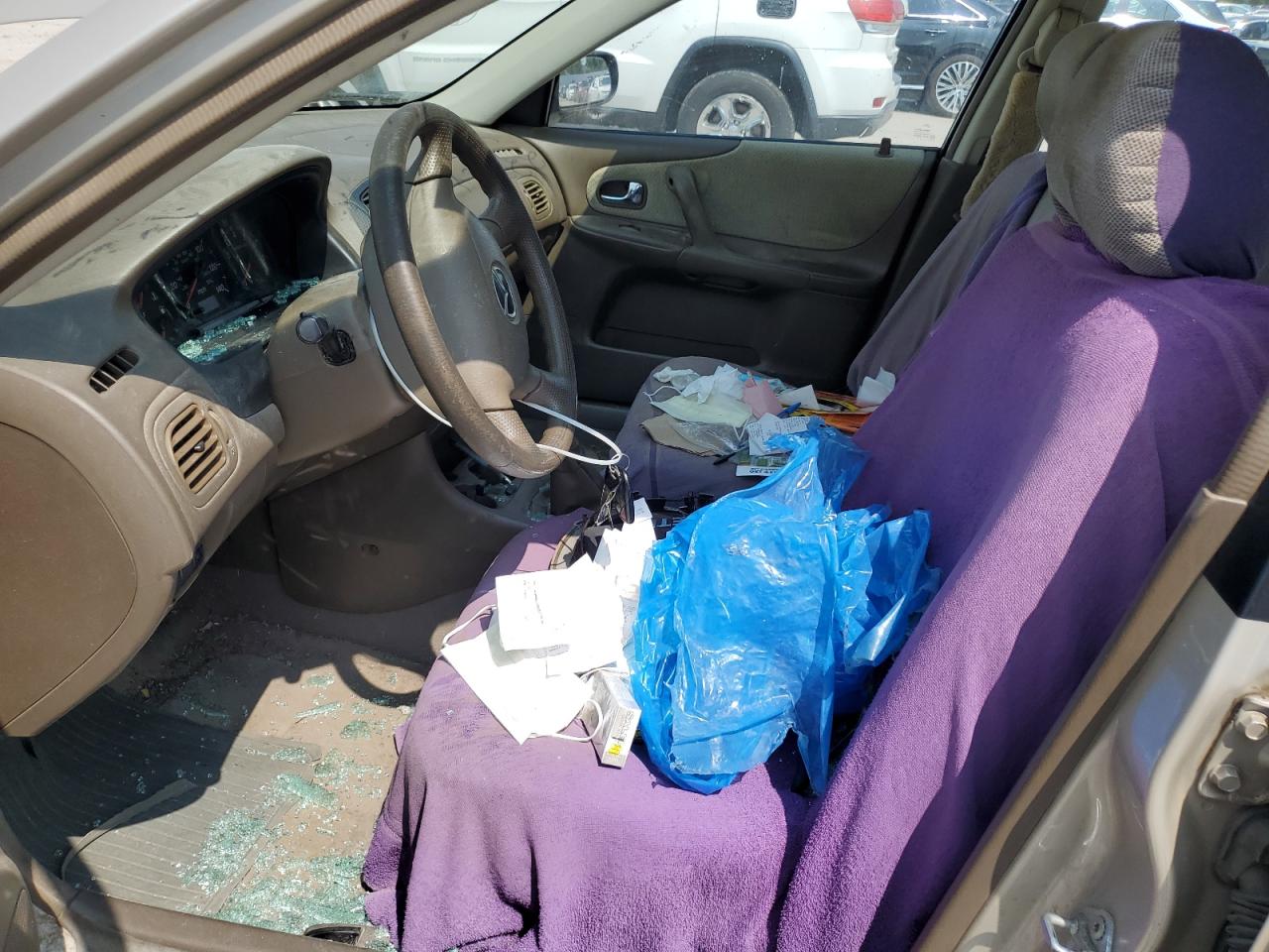 2000 Mazda Protege Dx VIN: JM1BJ2225Y0249762 Lot: 59950735