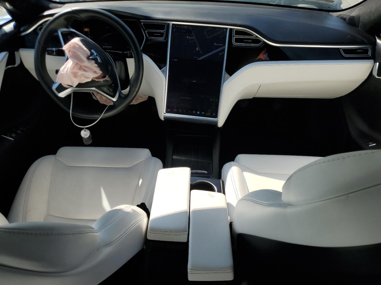 2017 Tesla Model S VIN: 5YJSA1E14HF209736 Lot: 62951675