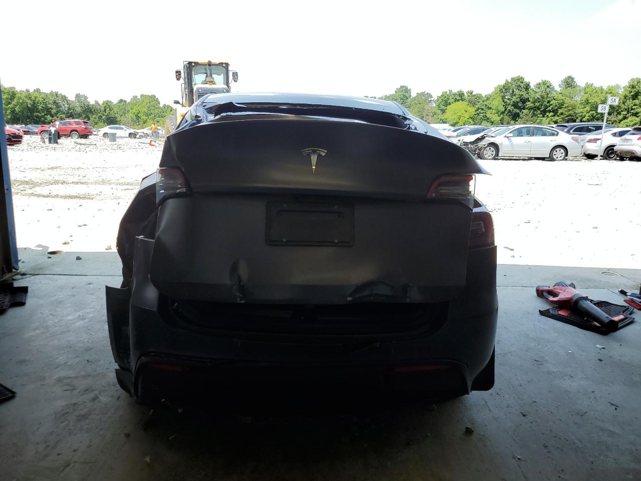 2023 Tesla Model Y VIN: 7SAYGDEE1PF667023 Lot: 60590395