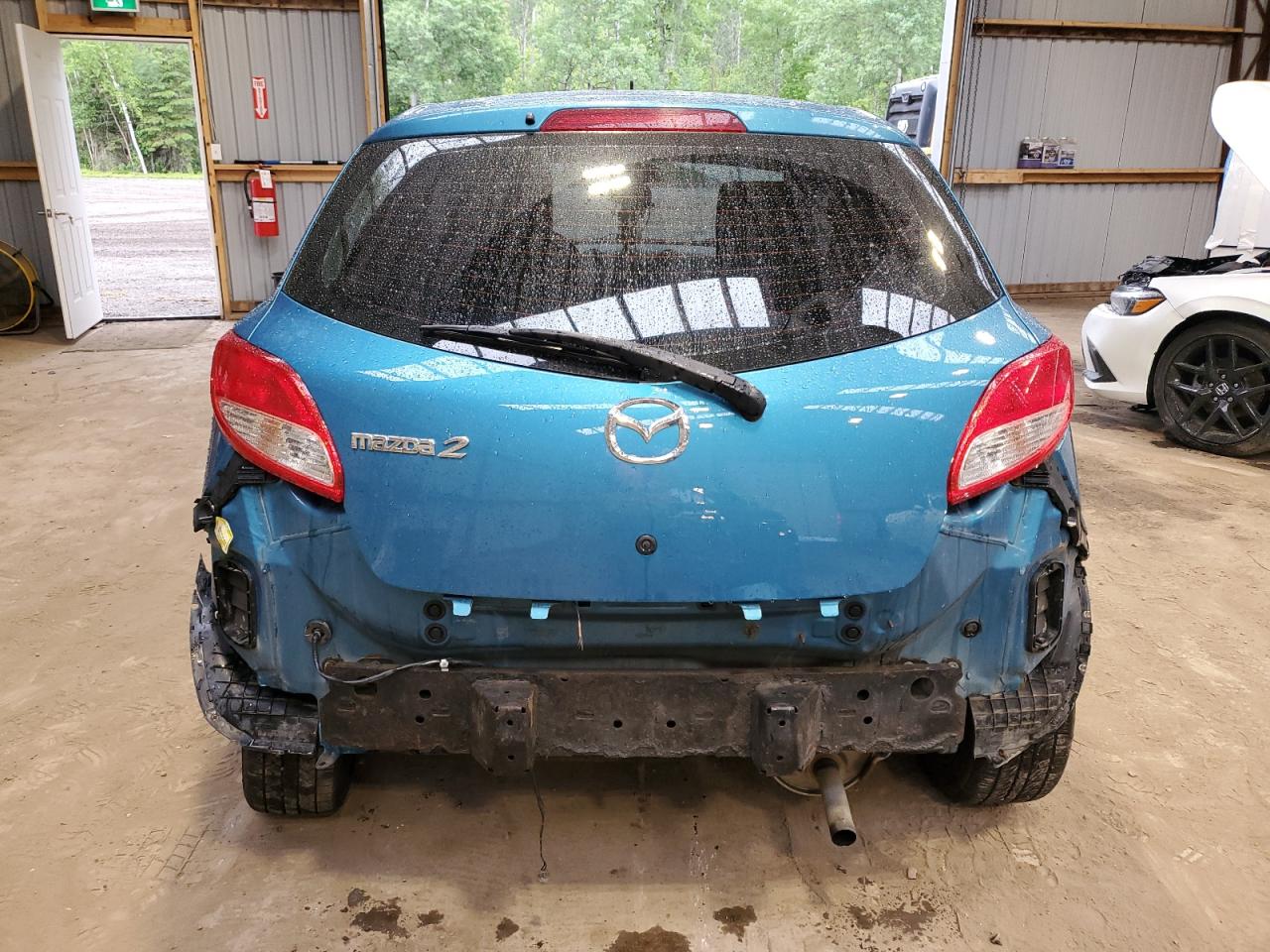 2011 Mazda Mazda2 VIN: JM1DE1HY2B0110845 Lot: 62768885
