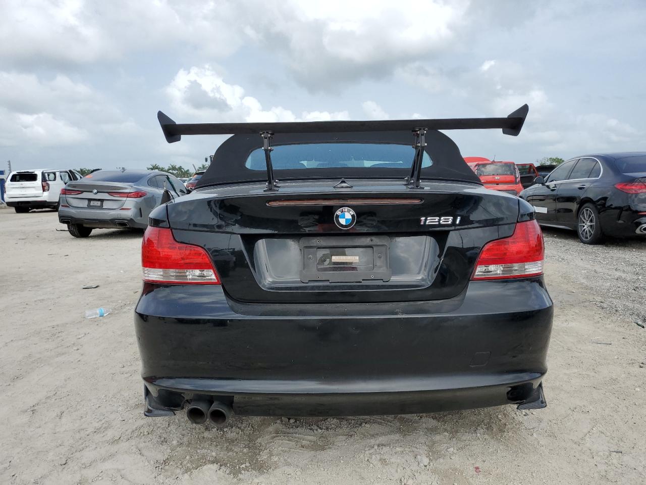 2011 BMW 128 I VIN: WBAUN1C55BVH83063 Lot: 62858125