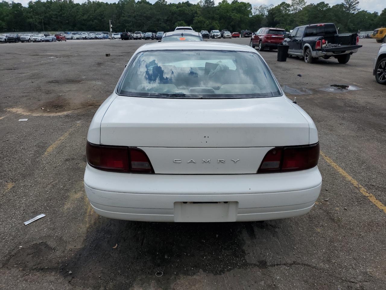 1995 Toyota Camry Le VIN: 4T1SK12E2SU874293 Lot: 59901215