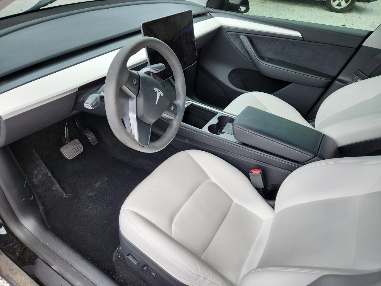 2023 Tesla Model Y VIN: 7SAYGDEE8PA163405 Lot: 62938275