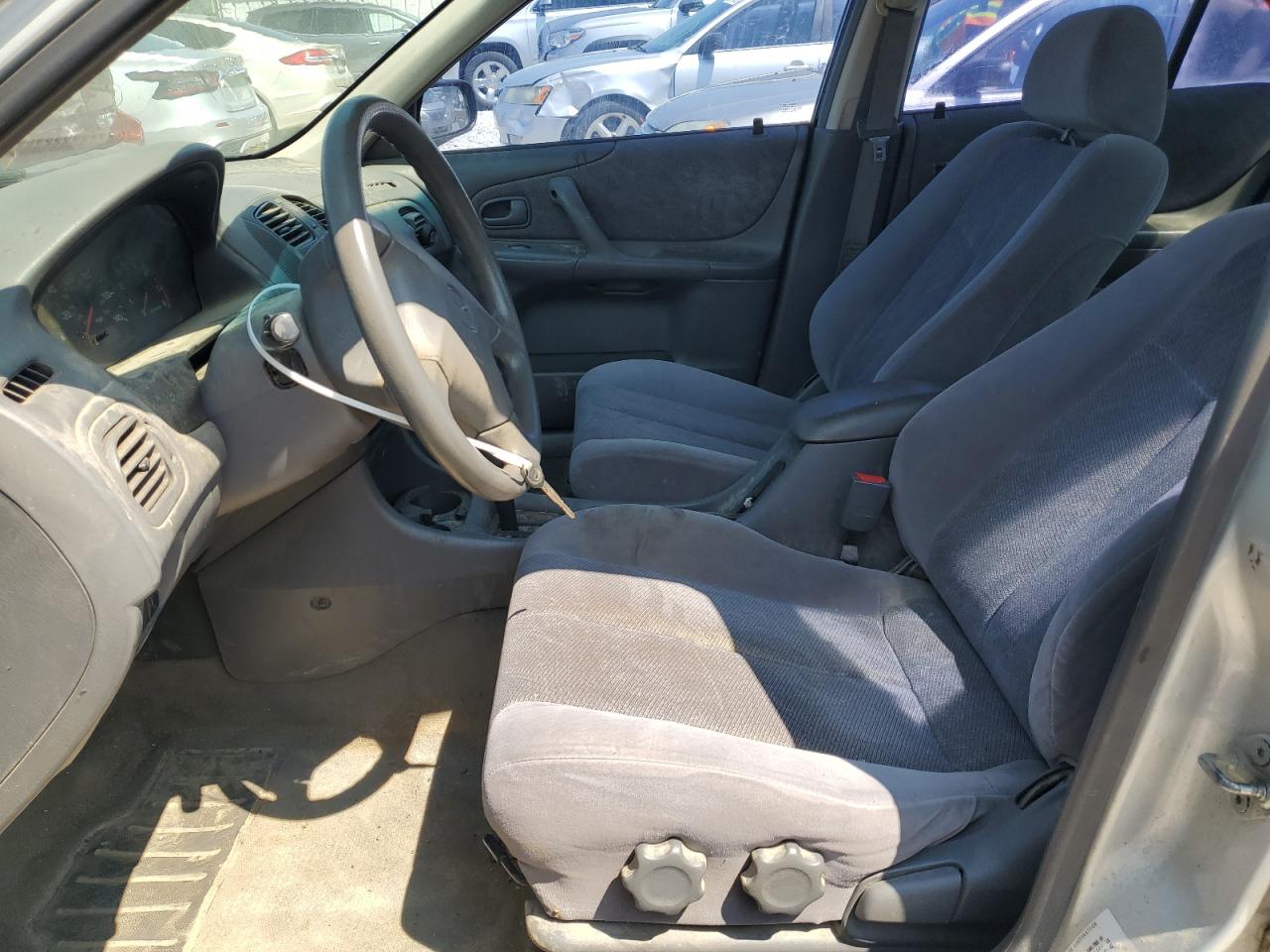 1999 Mazda Protege Es VIN: JM1BJ2216X0137767 Lot: 59116315