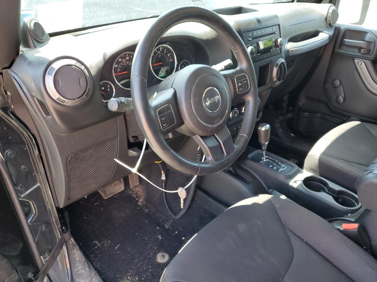2014 Jeep Wrangler Sport VIN: 1C4AJWAG2EL113843 Lot: 62771115