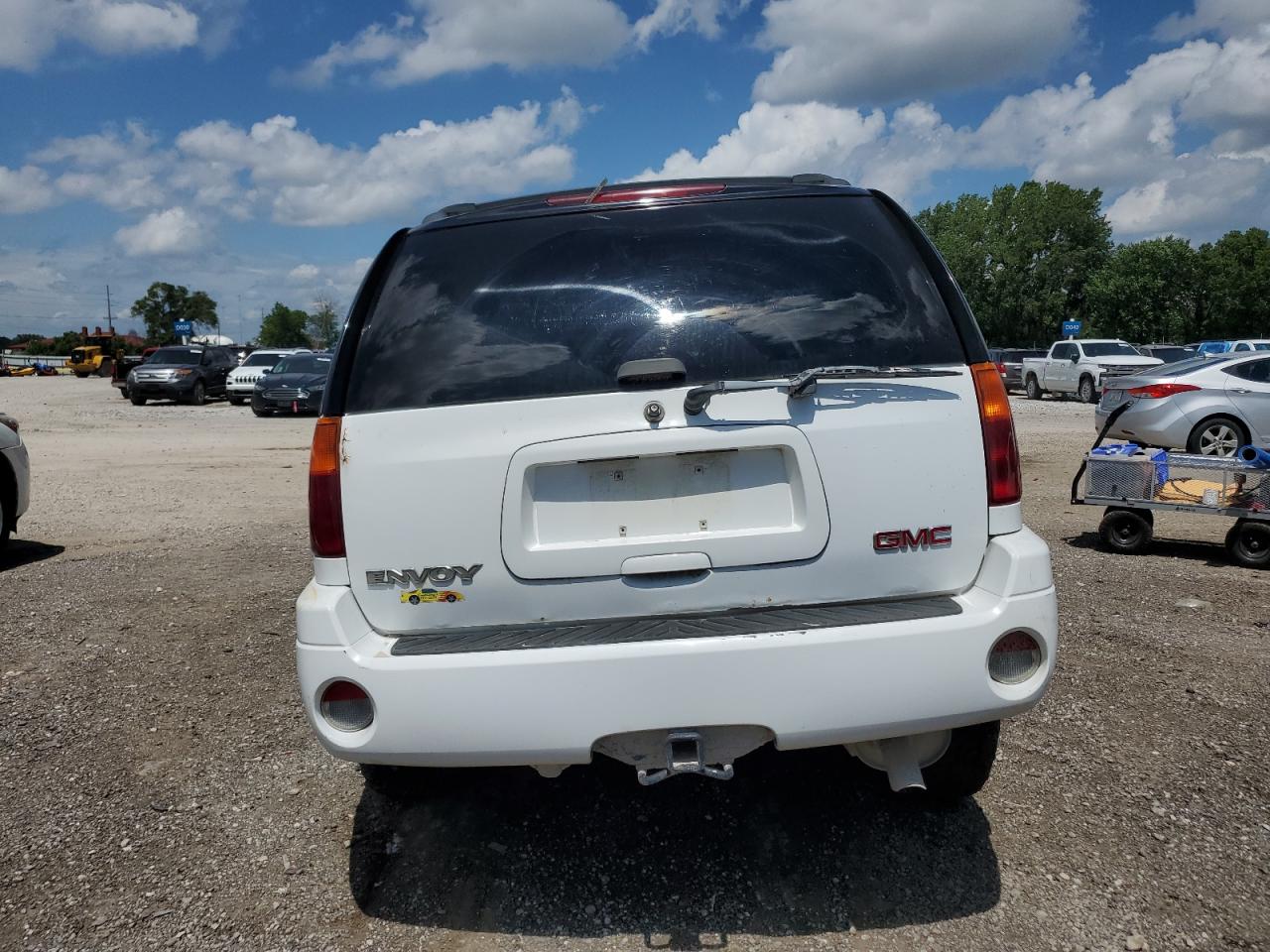 2004 GMC Envoy VIN: 1GKDT13SX42360404 Lot: 62078415