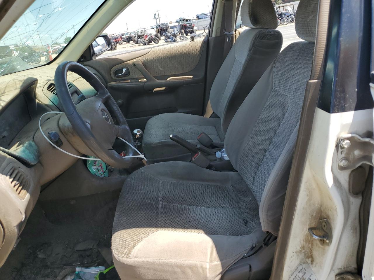 2000 Mazda Protege Dx VIN: JM1BJ2224Y0303231 Lot: 60853845