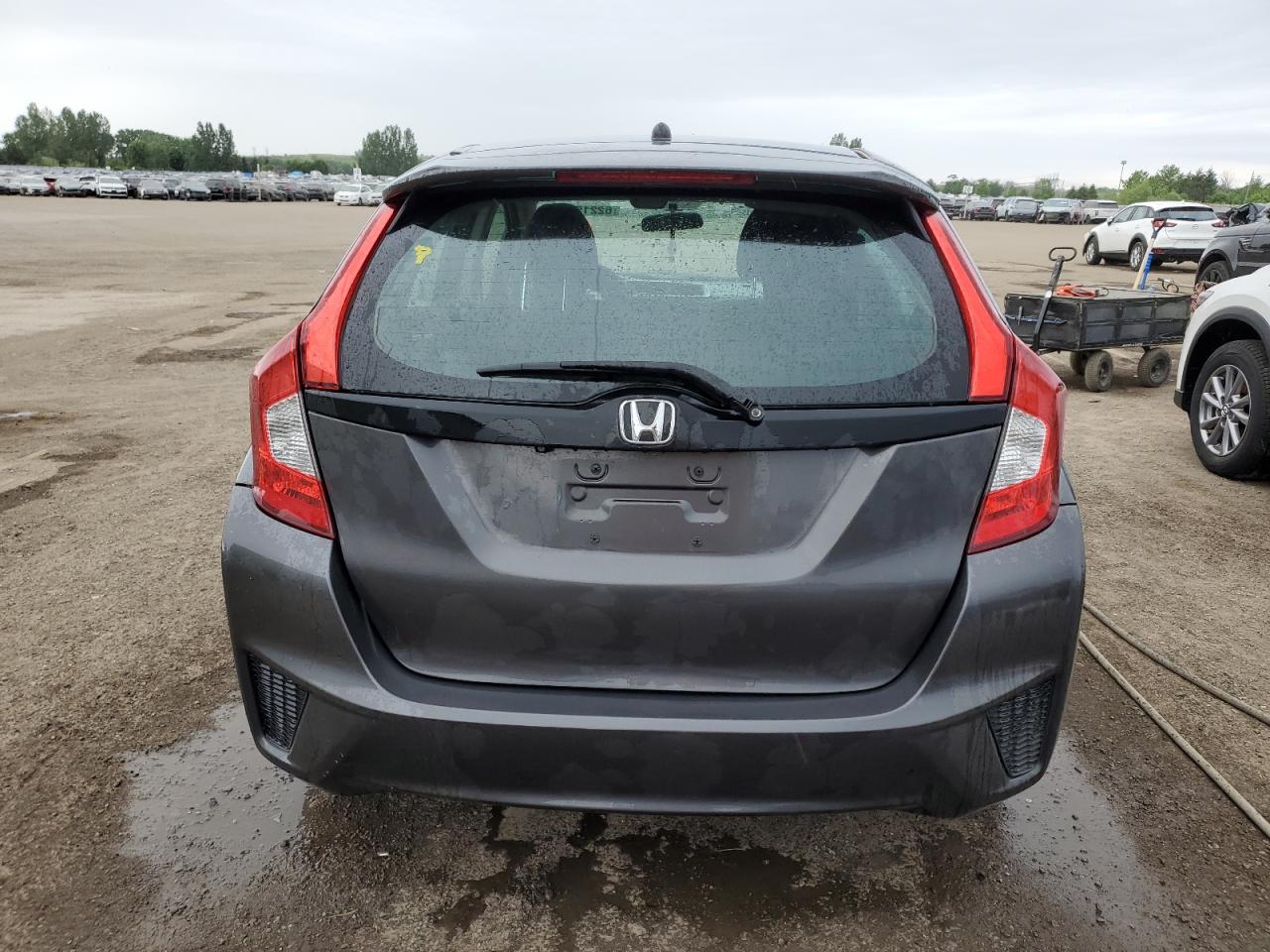 2015 Honda Fit Lx VIN: 3HGGK5H52FM104843 Lot: 62215185
