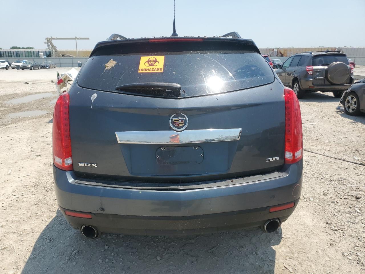 2013 Cadillac Srx VIN: 3GYFNAE36DS558805 Lot: 69027345
