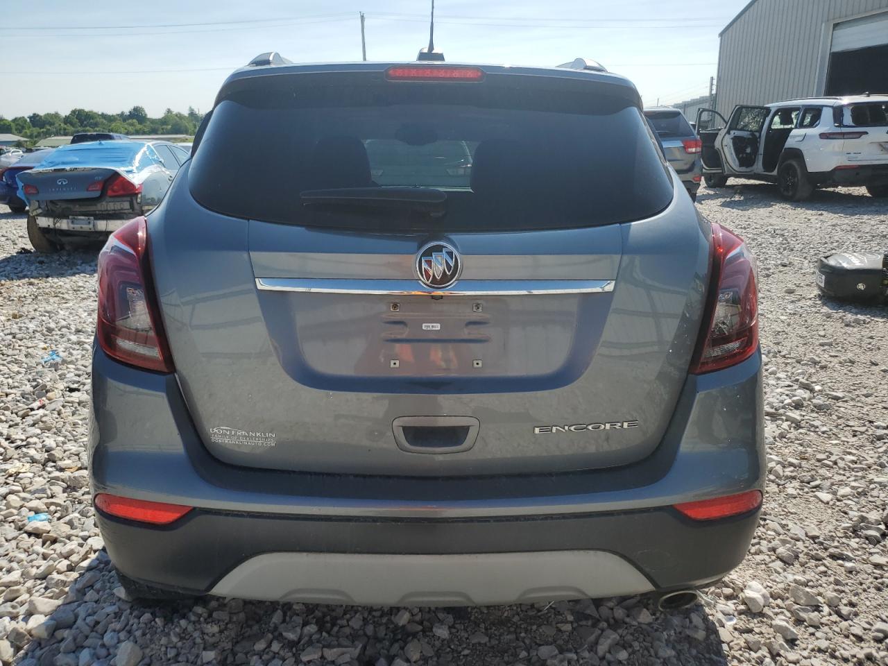 2019 Buick Encore Essence VIN: KL4CJCSMXKB841062 Lot: 58058145