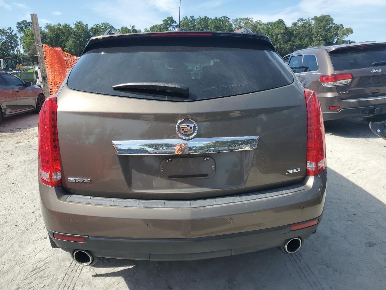 2015 Cadillac Srx Luxury Collection VIN: 3GYFNBE39FS523717 Lot: 62644175