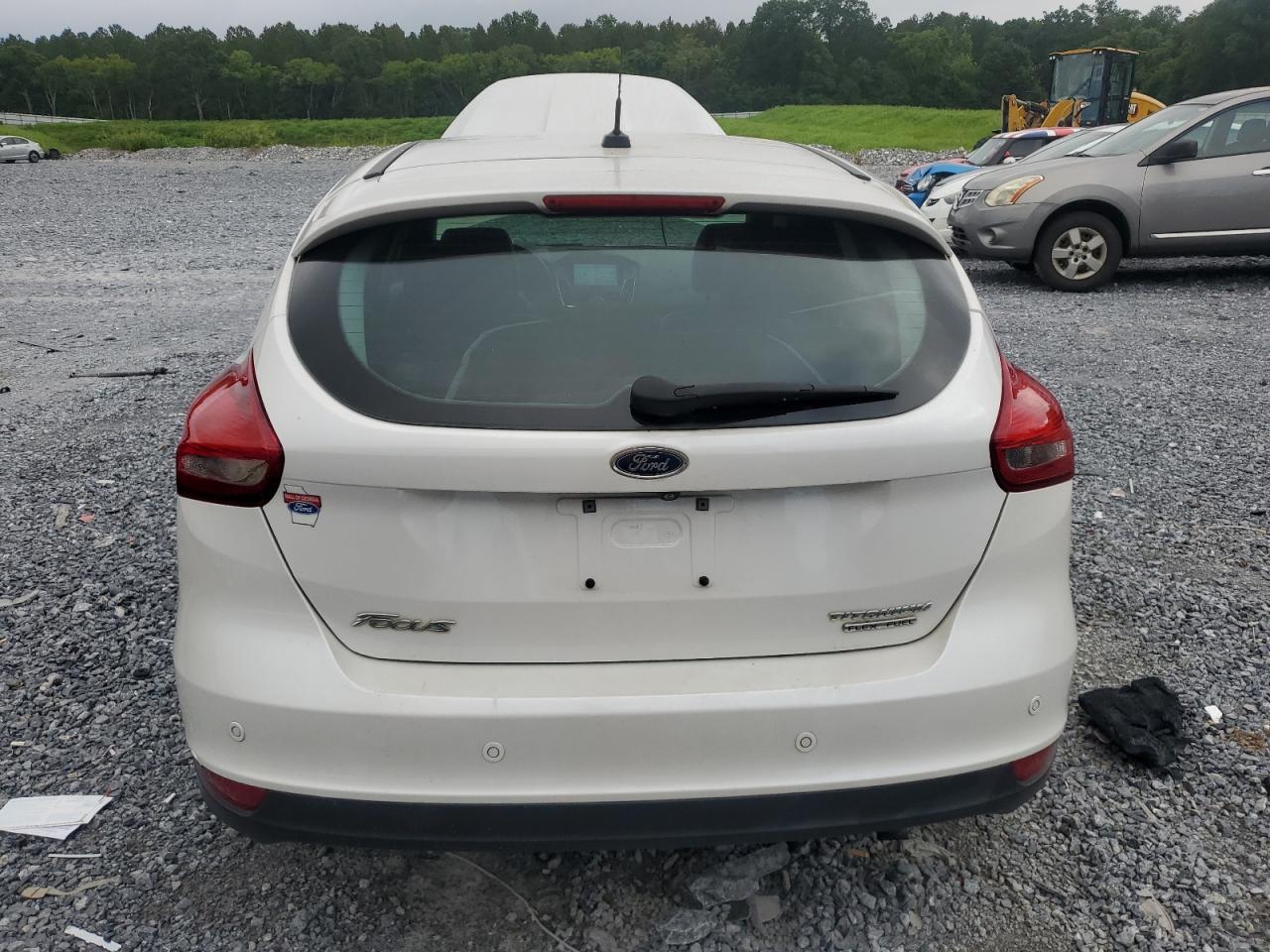 2016 Ford Focus Titanium VIN: 1FADP3N22GL292399 Lot: 63033385