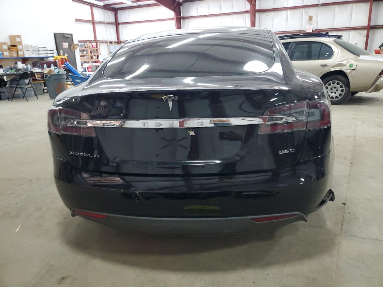 2015 Tesla Model S VIN: 5YJSA1E24FF117516 Lot: 61636465