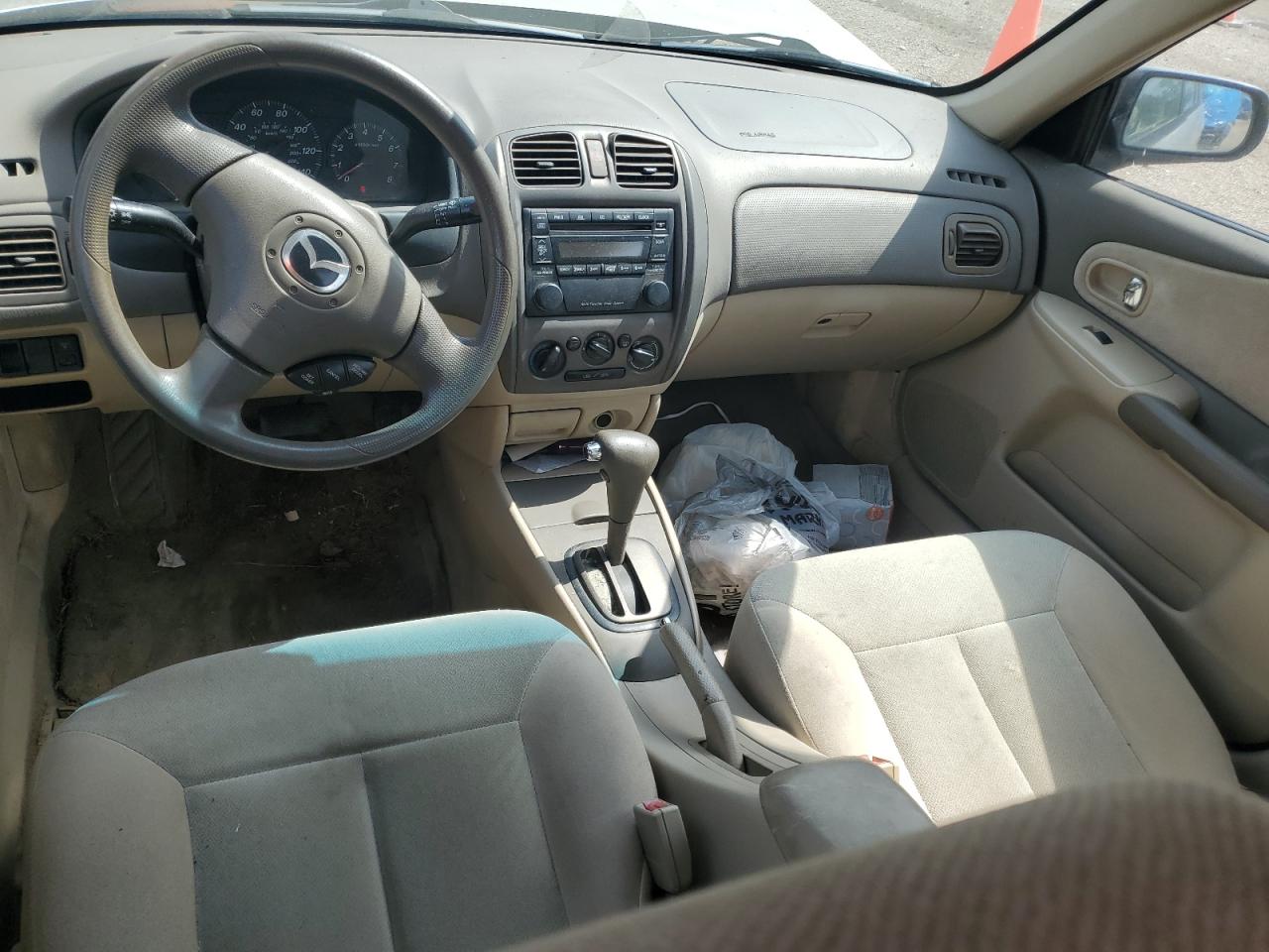 2002 Mazda Protege Dx VIN: JM1BJ225521563472 Lot: 60434555