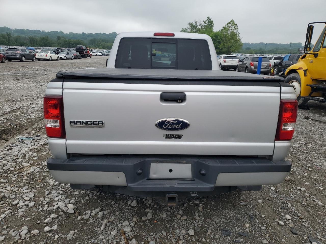 2011 Ford Ranger Super Cab VIN: 1FTKR1EEXBPB09990 Lot: 59963035