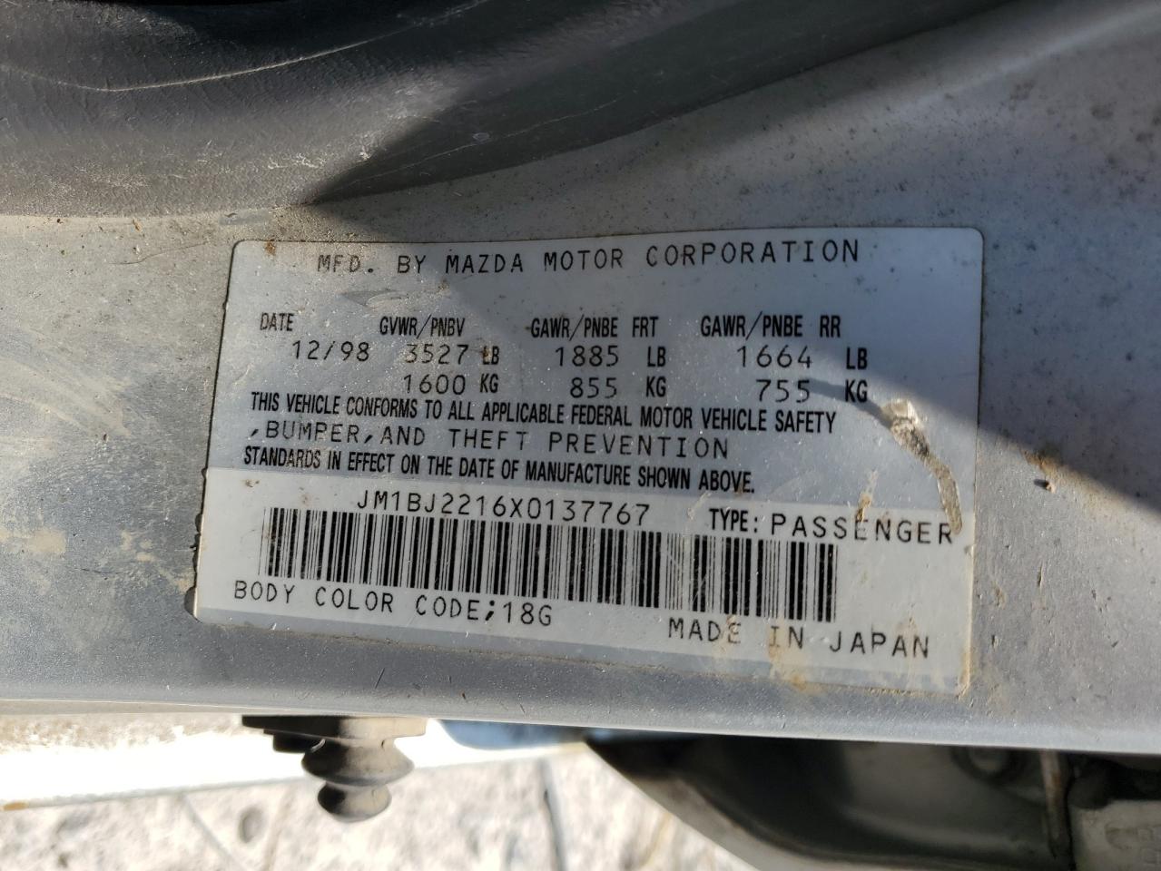 1999 Mazda Protege Es VIN: JM1BJ2216X0137767 Lot: 59116315