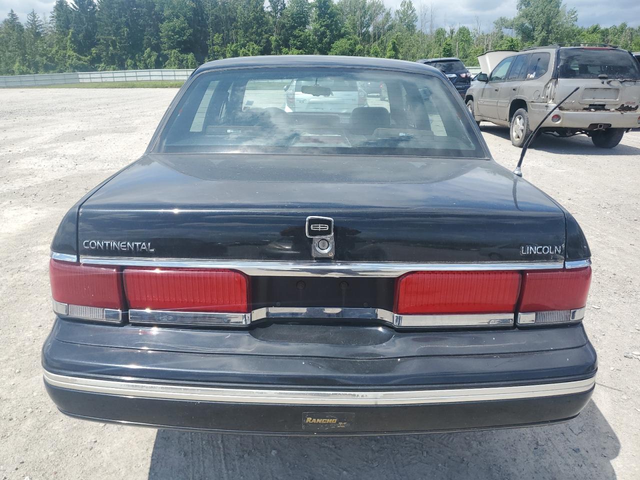 1990 Lincoln Continental Signature VIN: 1LNLM984XLY700400 Lot: 61182525