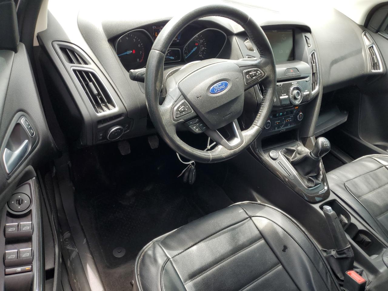 2015 Ford Focus Titanium VIN: 1FADP3N28FL239706 Lot: 62478895