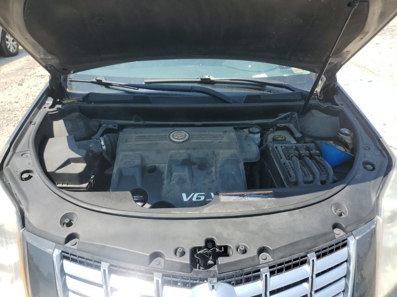 2013 Cadillac Srx VIN: 3GYFNAE36DS558805 Lot: 69027345