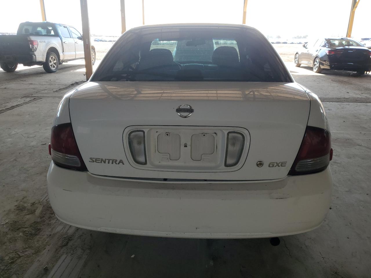 2003 Nissan Sentra Xe VIN: 3N1CB51D93L786302 Lot: 60112305