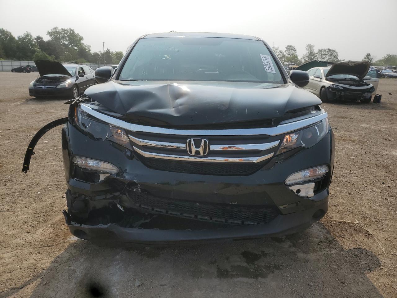 2017 Honda Pilot Lx VIN: 5FNYF6H14HB053900 Lot: 59289115