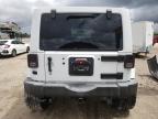 2015 JEEP WRANGLER UNLIMITED SAHARA   à vendre chez Copart FL - WEST PALM BEACH