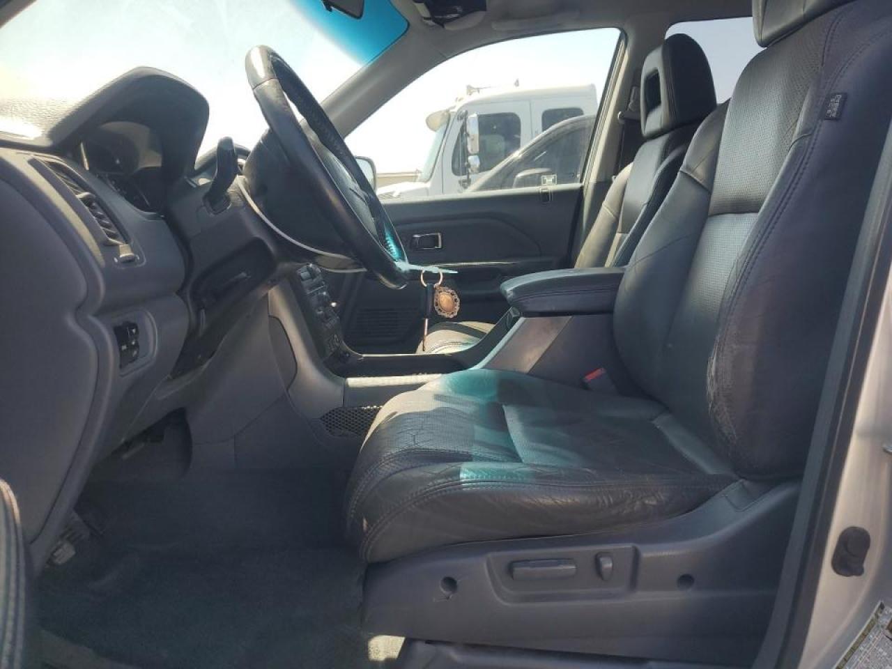 2004 Honda Pilot Exl VIN: 2HKYF18744H604779 Lot: 62360485
