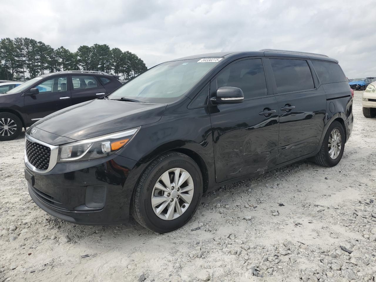 2017 Kia Sedona Lx للبيع في Loganville، GA - Side
