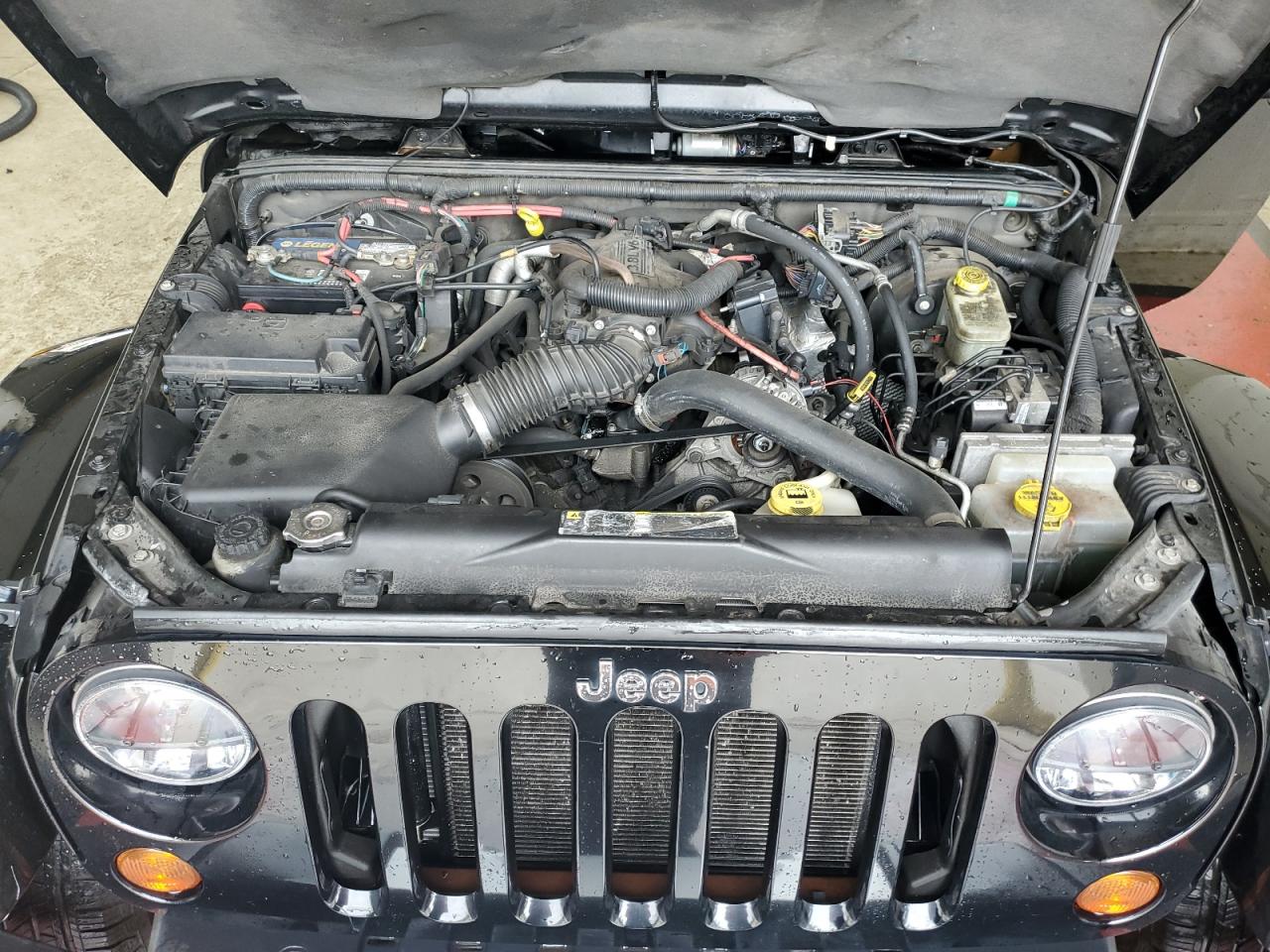 2011 Jeep Wrangler Sahara VIN: 1J4AA5D18BL606384 Lot: 61341025