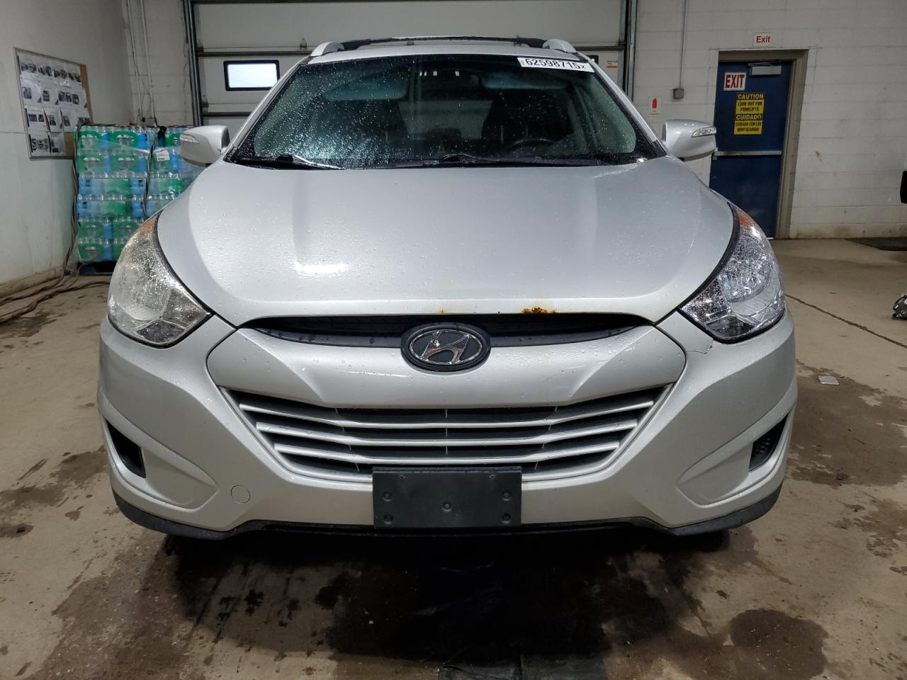 HYUNDAI TUCSON 2012 VIN KM8JUCAC6CU379419 фото 5