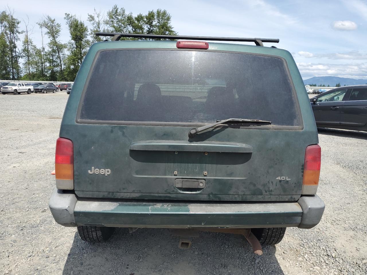 1999 Jeep Cherokee Sport VIN: 1J4FF68S2XL570795 Lot: 61860585