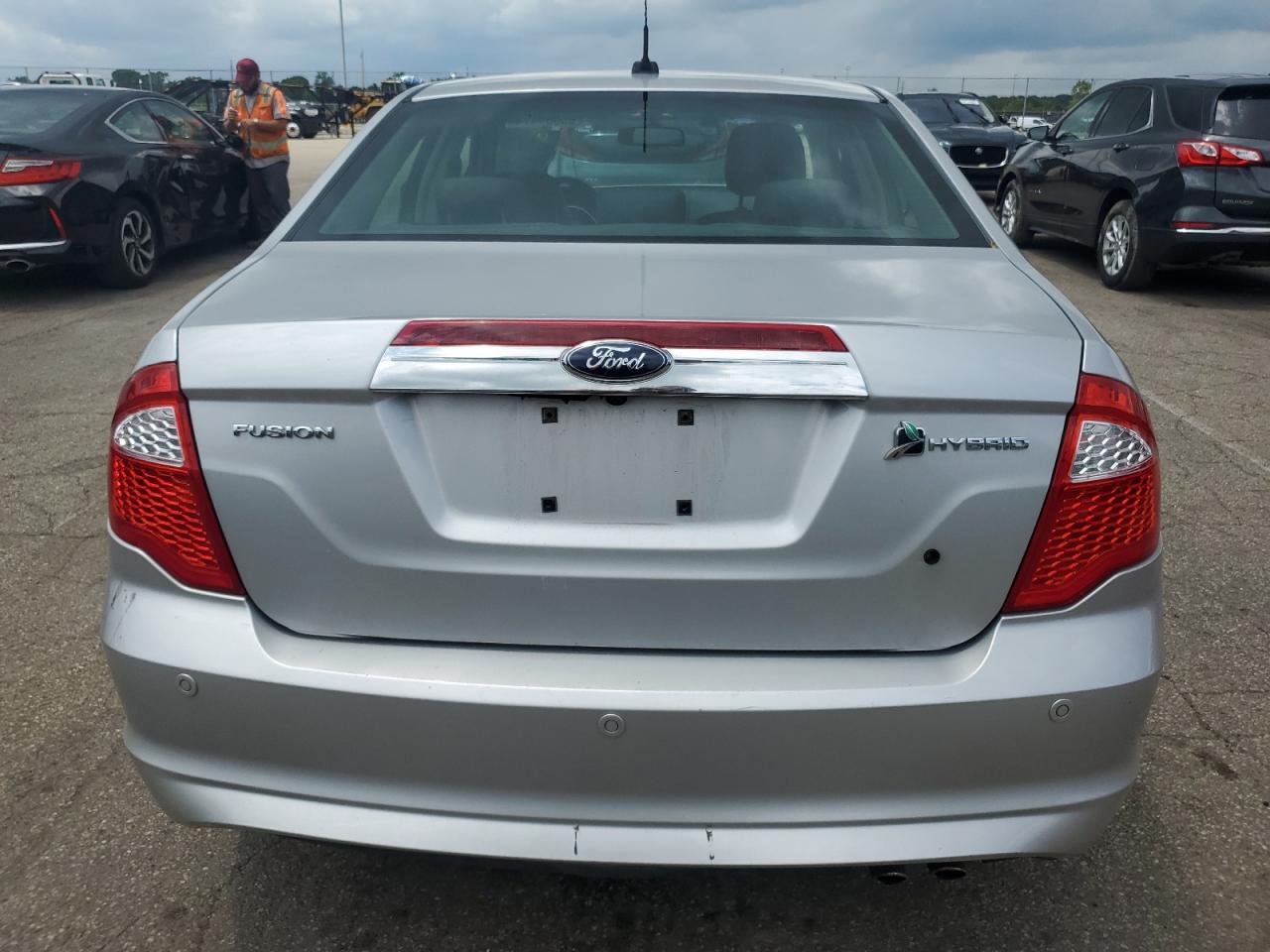 2010 Ford Fusion Hybrid VIN: 3FADP0L33AR140229 Lot: 63084475
