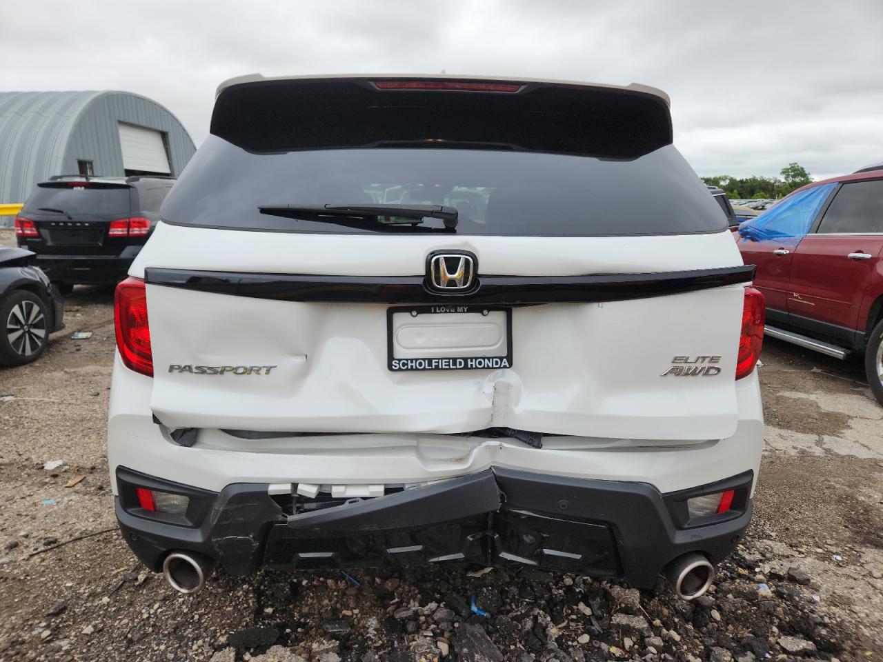 2022 Honda Passport Elite VIN: 5FNYF8H06NB006902 Lot: 60640315