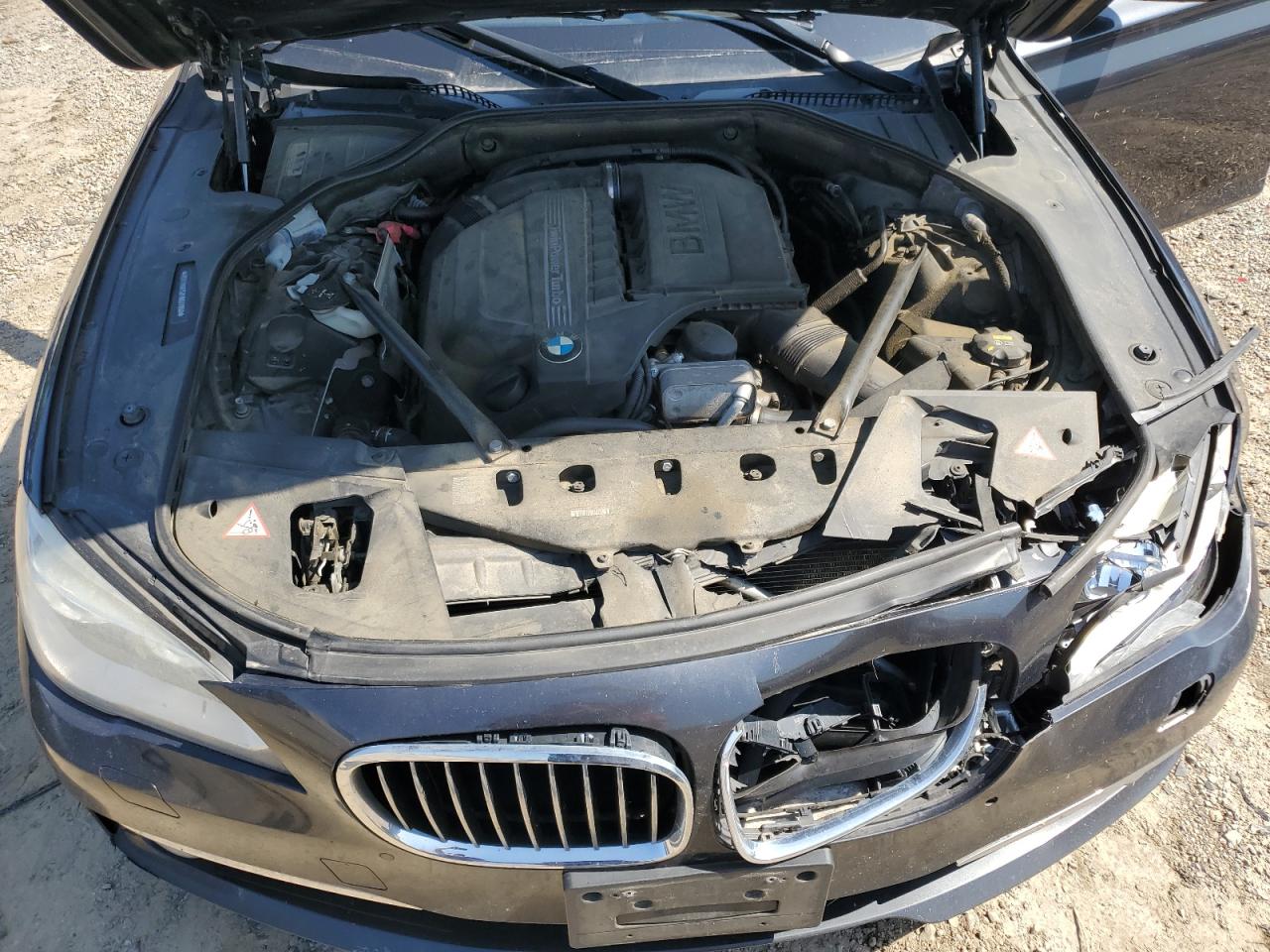2015 BMW 740 I VIN: WBAYA6C52FD827068 Lot: 61811055