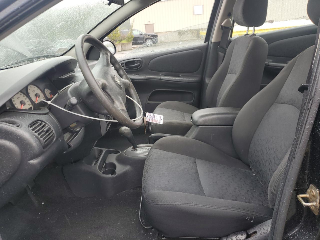 2002 Dodge Neon Es VIN: 1B3ES56C02D577803 Lot: 58838175