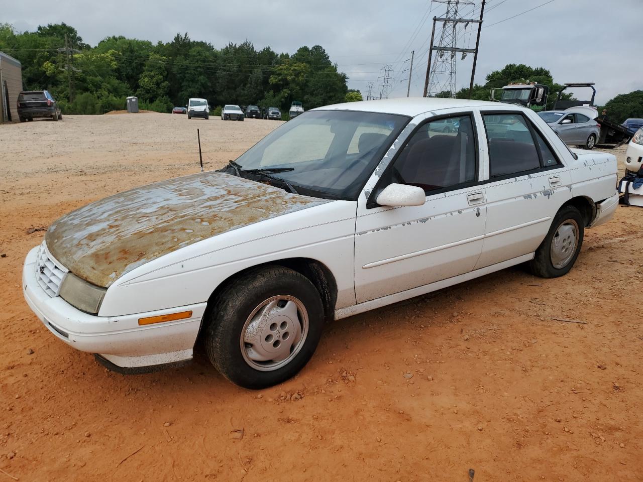 1G1LD5548SY133838 CHEVROLET CORSICA Photo 1