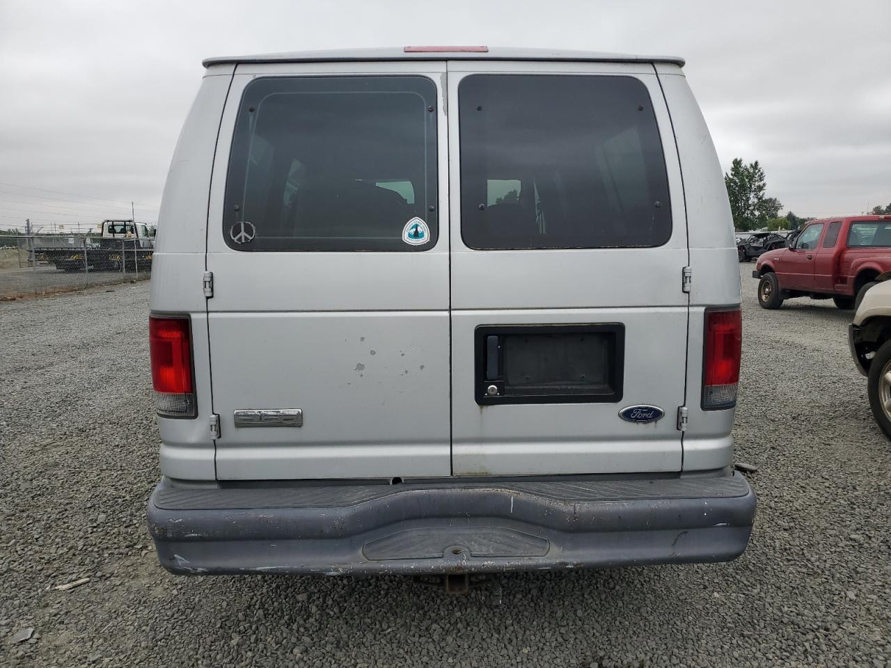 2006 Ford Econoline E150 Wagon VIN: 1FMRE11W96DA65010 Lot: 61623085