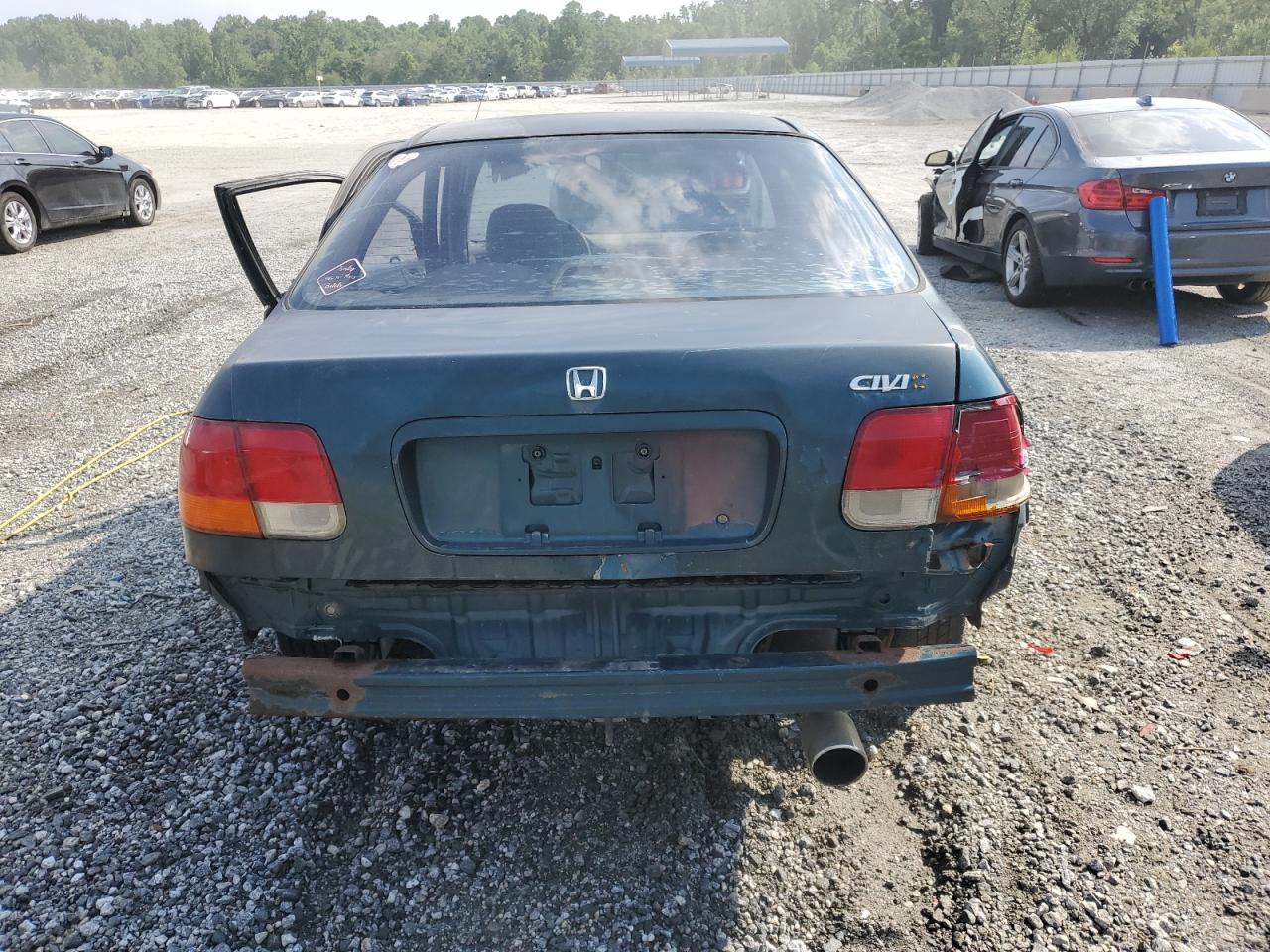 1998 Honda Civic Ex VIN: 1HGEJ8641WL048157 Lot: 59308335